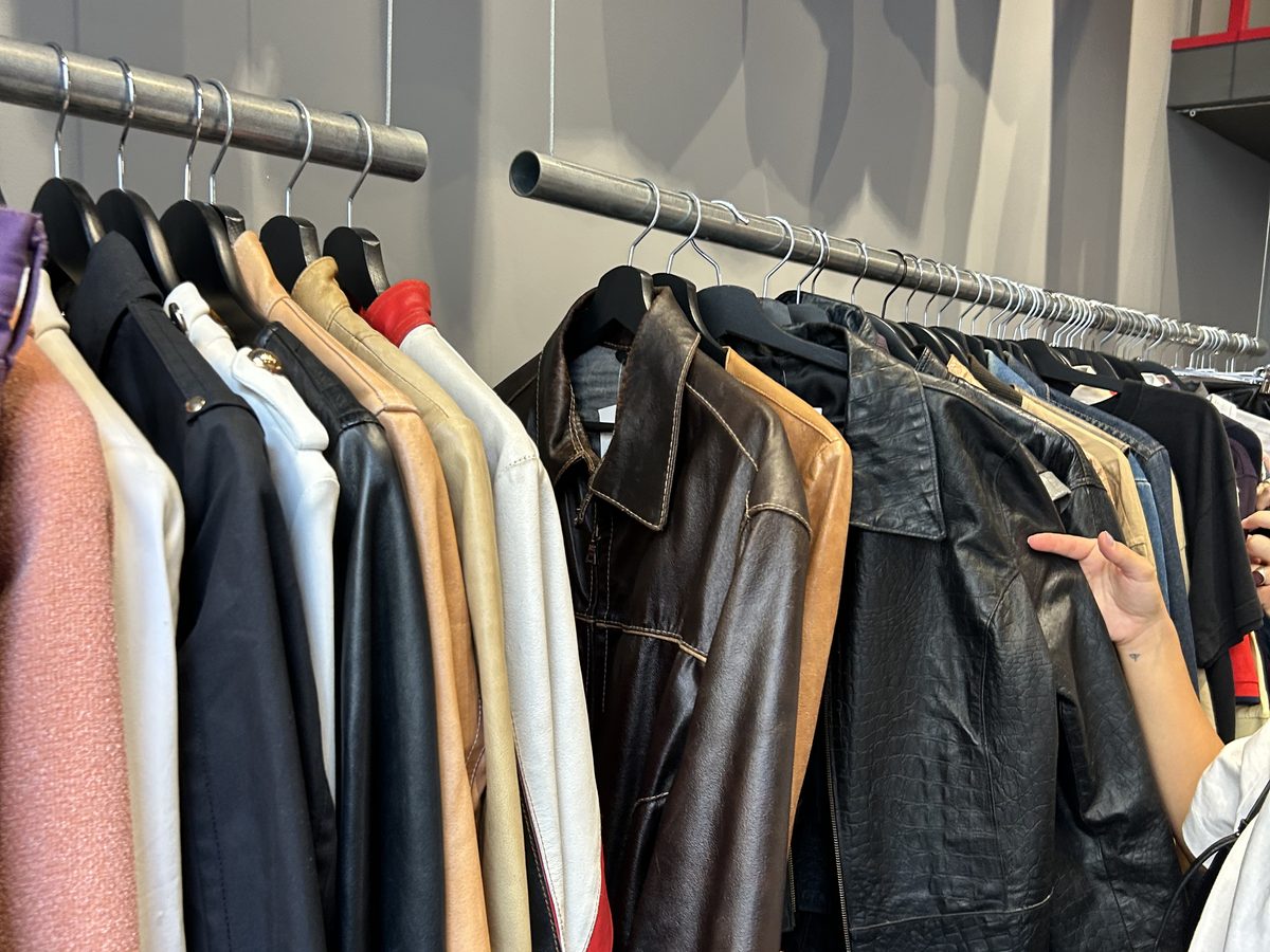 Racks of vintage jackets and coats in a second-hand shop